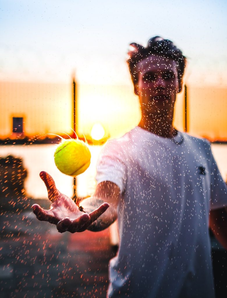 Selective Focus Photo Of Tennis Ball